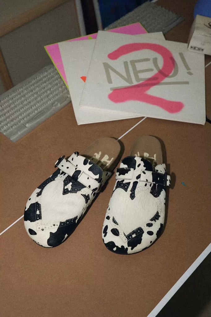 CONP HeartClosed Cow-Print Buckle Clogs