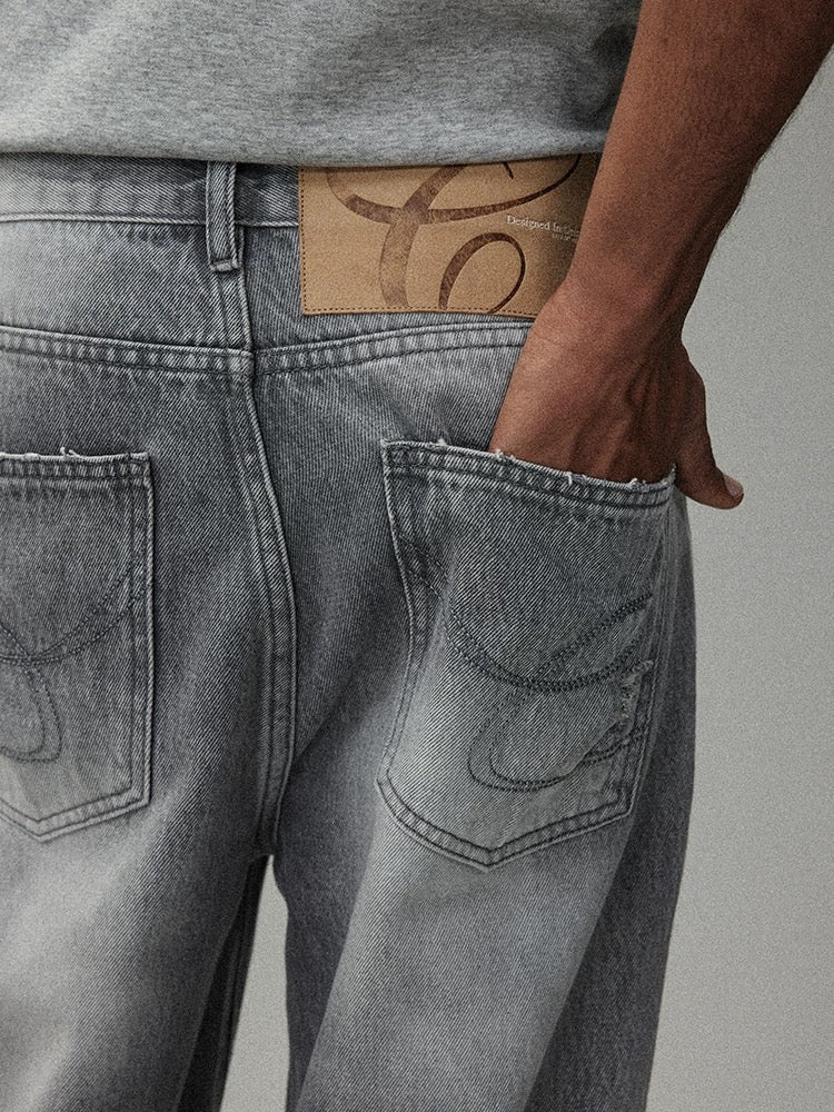CRICLE CAGE Washed Flare Jeans