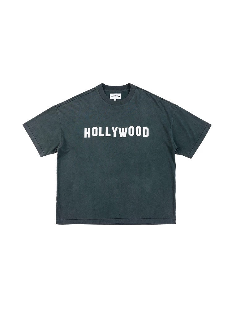 Dark gray t-shirt with 'HOLLYWOOD' text on a white background