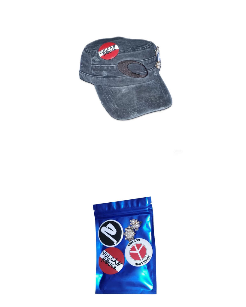 Blue denim cap with patches and a blue package with logos on a white background